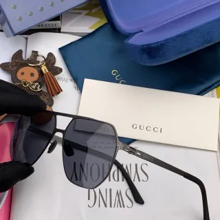 Gucci نظارات شمسية بإطار معدني ملهمة من الطيار ولينز تدرجي