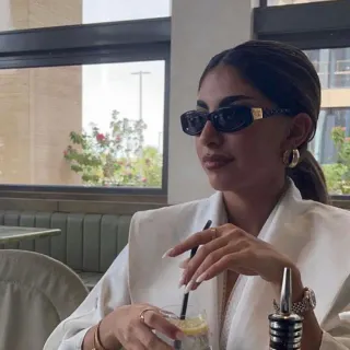 Gucci نظارات شمسية إطار مستطيل ضيق أسيتات أمامي أسود وذهبي