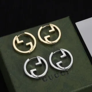 Gucci GG أقراط حلقان ذهبي فضي شعار G متشابك مفصل