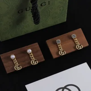 Gucci GG Marmont أقراط سلاسل قطرة لؤلؤي وكريستال