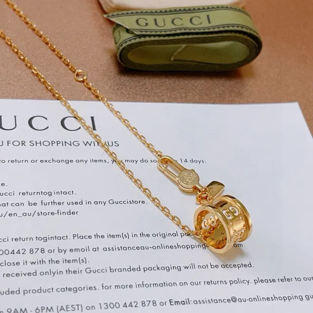 Gucci GG Marmont Gold-Tone Rotating Pendant Necklace 6