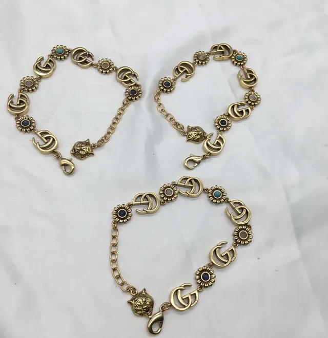 Gucci সোনা নীল ধাতু Interlocking GG লিংকস ব্রেসলেট 3