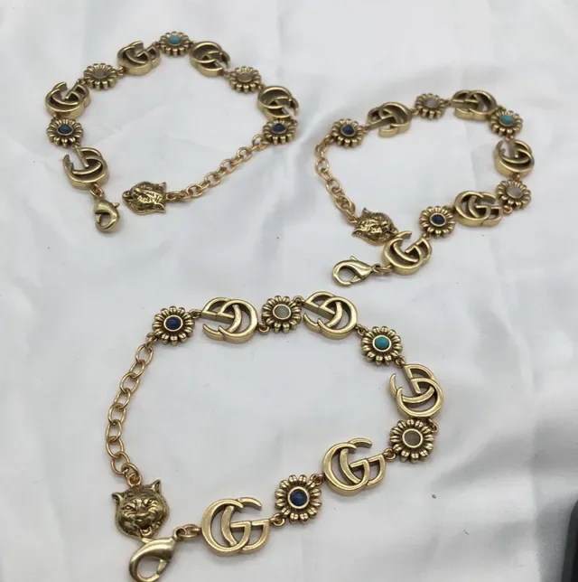 Gucci সোনা নীল ধাতু Interlocking GG লিংকস ব্রেসলেট 5