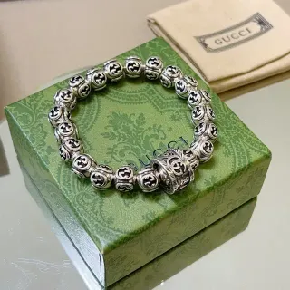 سوار Gucci Interlocking G فضي أسود خرز الموضوع سوار معدني