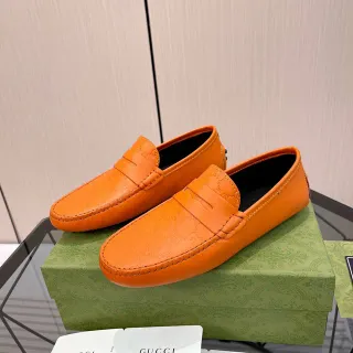 Gucci কমলা কালো খোদাই GG মনোগ্রাম পেনি স্ট্র্যাপ লুফার