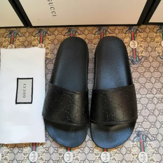 Gucci 黑色压花 GG Monogram 拖鞋