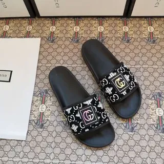 Gucci Slide negro multicolor suela moldeada correa impresa ancha sandalias