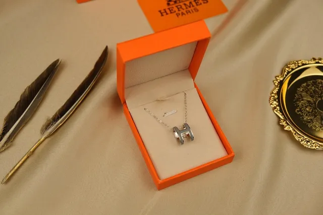 Hermès Silver Orange Open H-Shaped Pendant Polished Metal Necklace 3
