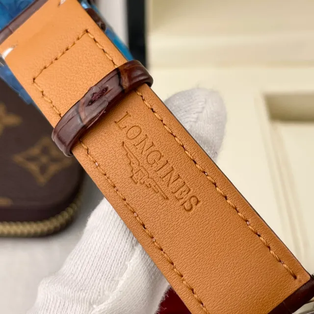 Longines Caja Redonda Marrón Dorado Marcadores de Hora en Numerales Romanos Reloj Mecánico 3