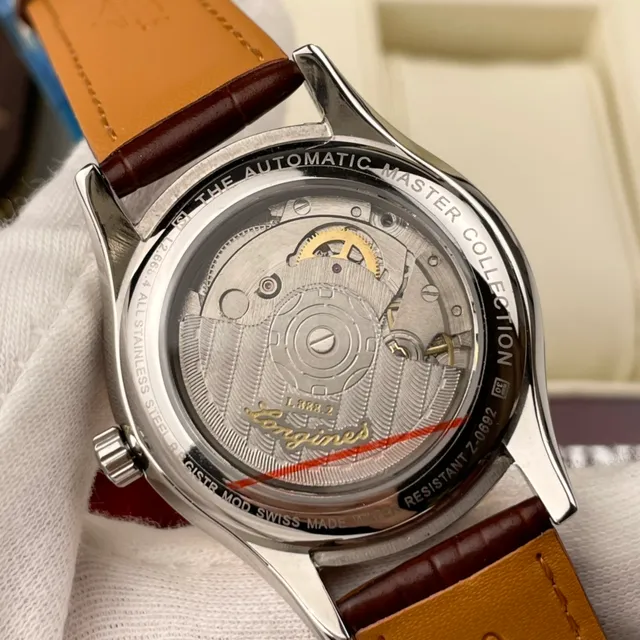 Longines Caja Redonda Marrón Dorado Marcadores de Hora en Numerales Romanos Reloj Mecánico 4