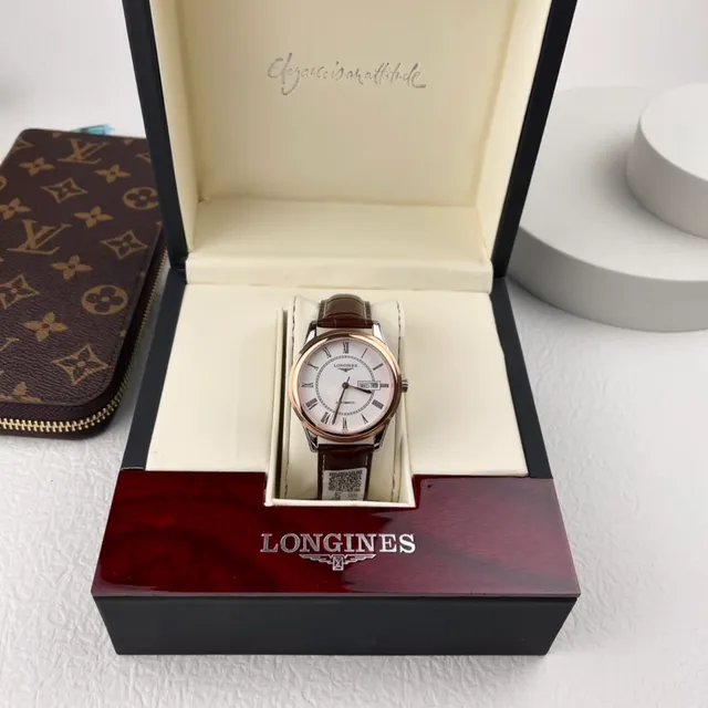 Longines Caja Redonda Marrón Dorado Marcadores de Hora en Numerales Romanos Reloj Mecánico 9