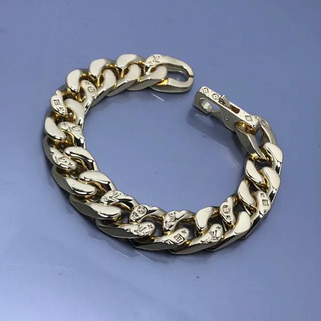 Louis Vuitton Chain Reaction Monogram Star Curb-Link Gold-Tone سوار 4