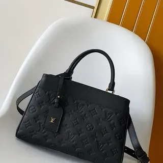 Louis Vuitton Lockme काला एम्बॉस्ड मोनोग्राम संरचित बॉस्टन बैग