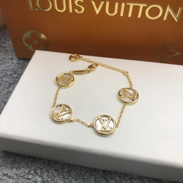 Louis Vuitton LV Circle أقراط دائرية معدنية ذهبية بيضاء 4