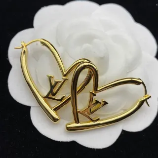 Louis Vuitton LV Aros de coração com monograma em tom dourado