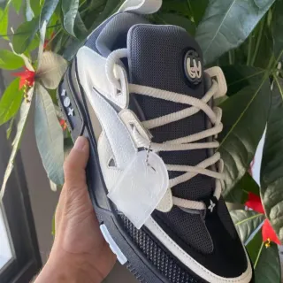 Louis Vuitton LV Trainer Negro Blanco Malla Multicapa Y Cuero Superior Tacón Circular Logo Lifestyle Sneakers