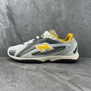 New Balance 灰黄色 分层合成和网面鞋面 醒目'N'标志 生活方式运动鞋