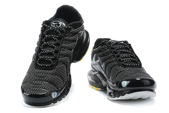 Nike Air Max Plus Black and White Lifestyle Sneakers 6