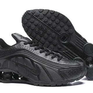 Nike أسود أحادي اللون مثقوب جلد علوي أسلوب حياة أحذية رياضية