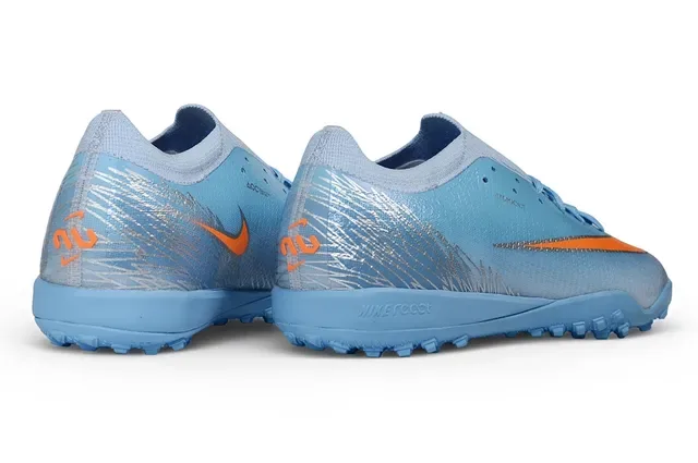 Nike أحذية كرة القدم للعشب الاصطناعي أزرق وبرتقالي أعلى منسوج رسومات فضية انعكاسية 5