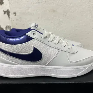 Nike Booker أبيض بنفسجي علوة نسيجية وجلدية براقة عارضة الكعب حذاء رياضي أسلوب حياة