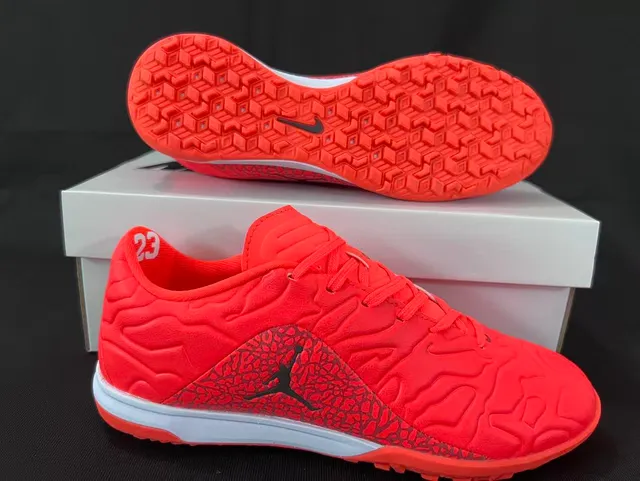 Nike zapatos de fútbol indoor naranja y negro con parte superior sintética moldeada y superposición de patrón de ola texturizado 7