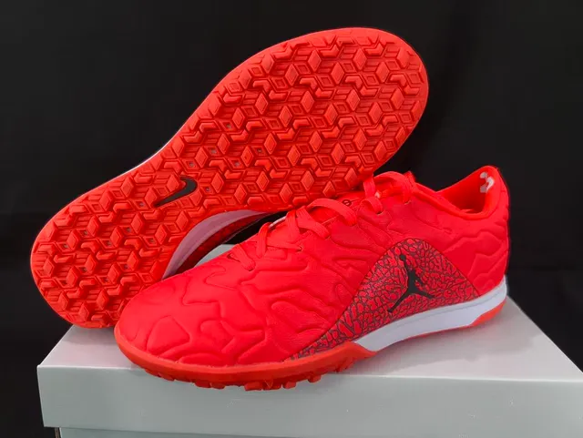 Nike zapatos de fútbol indoor naranja y negro con parte superior sintética moldeada y superposición de patrón de ola texturizado 8
