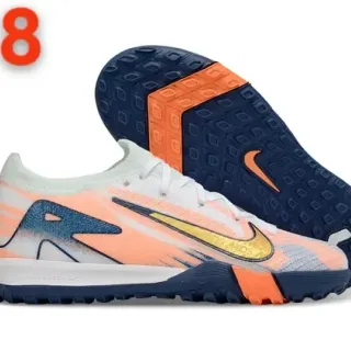 Chaussures de football Nike Orange Navy avec upper en knit et overlay d'impression graphique pour turf