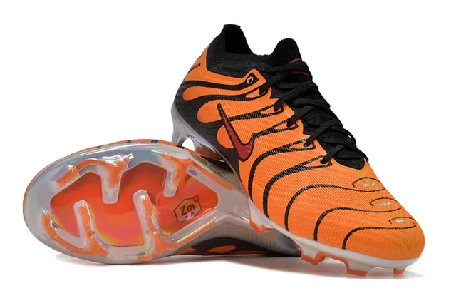 Nike Phantom GT Chuteira Orange Flame Knit para campo firme 2