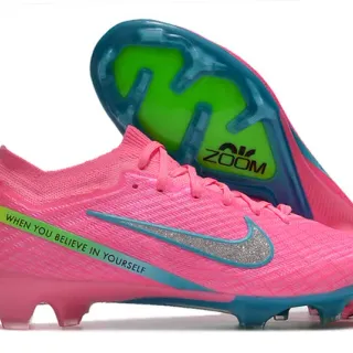 Nike Chaussures de football rose bleu upper tricoté col bas terrain ferme