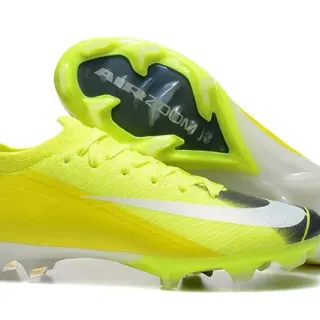 Nike Sapatos de futebol low-cut amarelo branco com upper de knit e cordões assimétricos para terreno firme