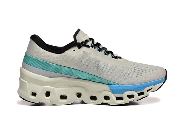On Cloudmonster gris claro azul teal zapatillas de running 4