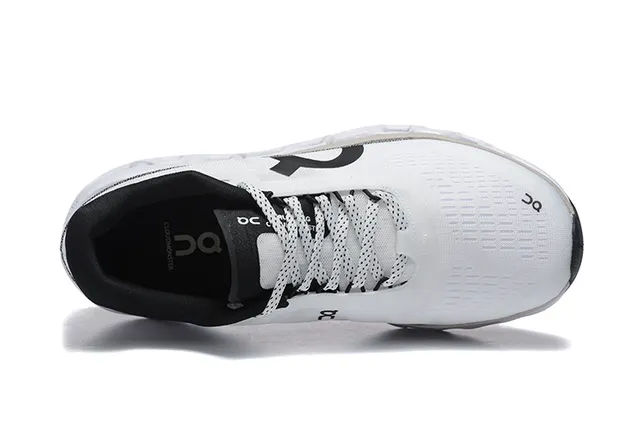 On Cloudmonster Zapatillas blancas y negras para correr 3