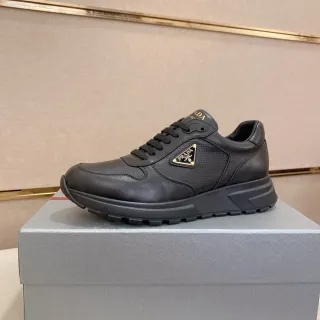 Prada Black Gold Leather And Perforated Upper Triangular Logo Chunky Sneakers
