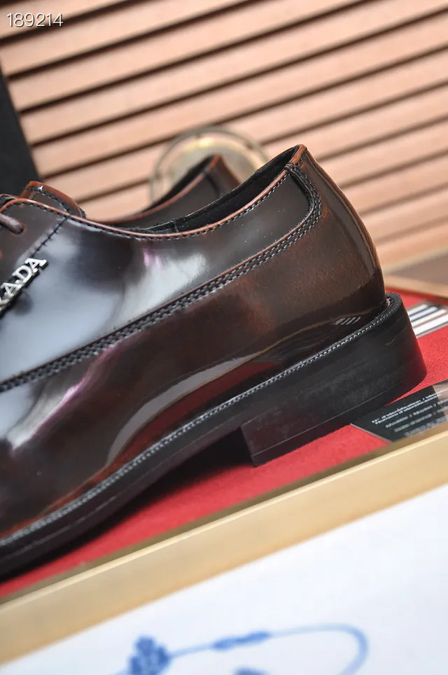 Prada 棕黑牛头孔眼布洛克牛津鞋 4
