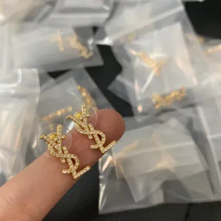 सेंट लॉरेंट YSL लोगो स्टड गोल्ड पारदर्शी क्रिस्टल पावे कर्णफूल