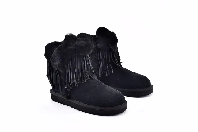 UGG डार्लाला क्लासिक काला फ्रिंज्ड शीयर्लिंग-कफ्ड एंक्ल बूट्स 9