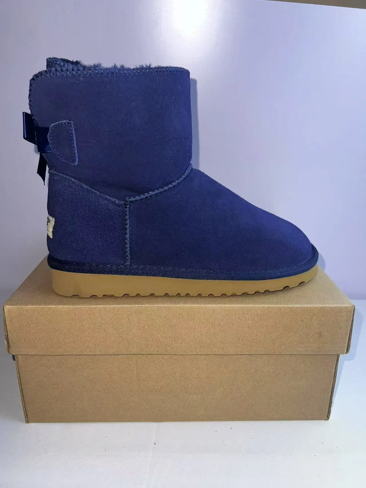UGG Tasman Navy Satin Bow أحذية ثلجية 3