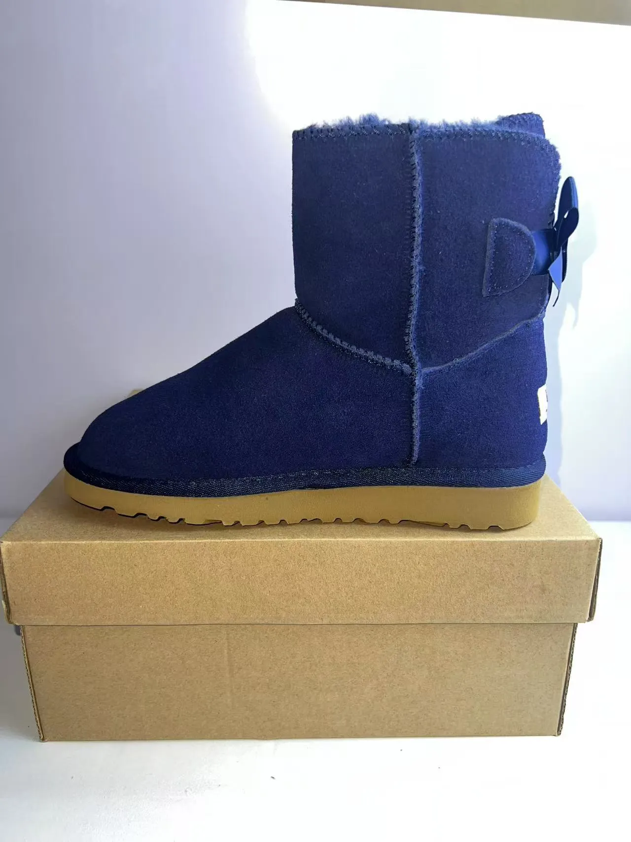 UGG Tasman Navy Satin Bow أحذية ثلجية 4