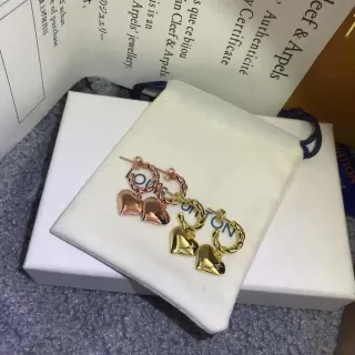 Van Cleef & Arpels Gold Pink Heart-Shaped Charms Twisted Rope Hoops Earrings