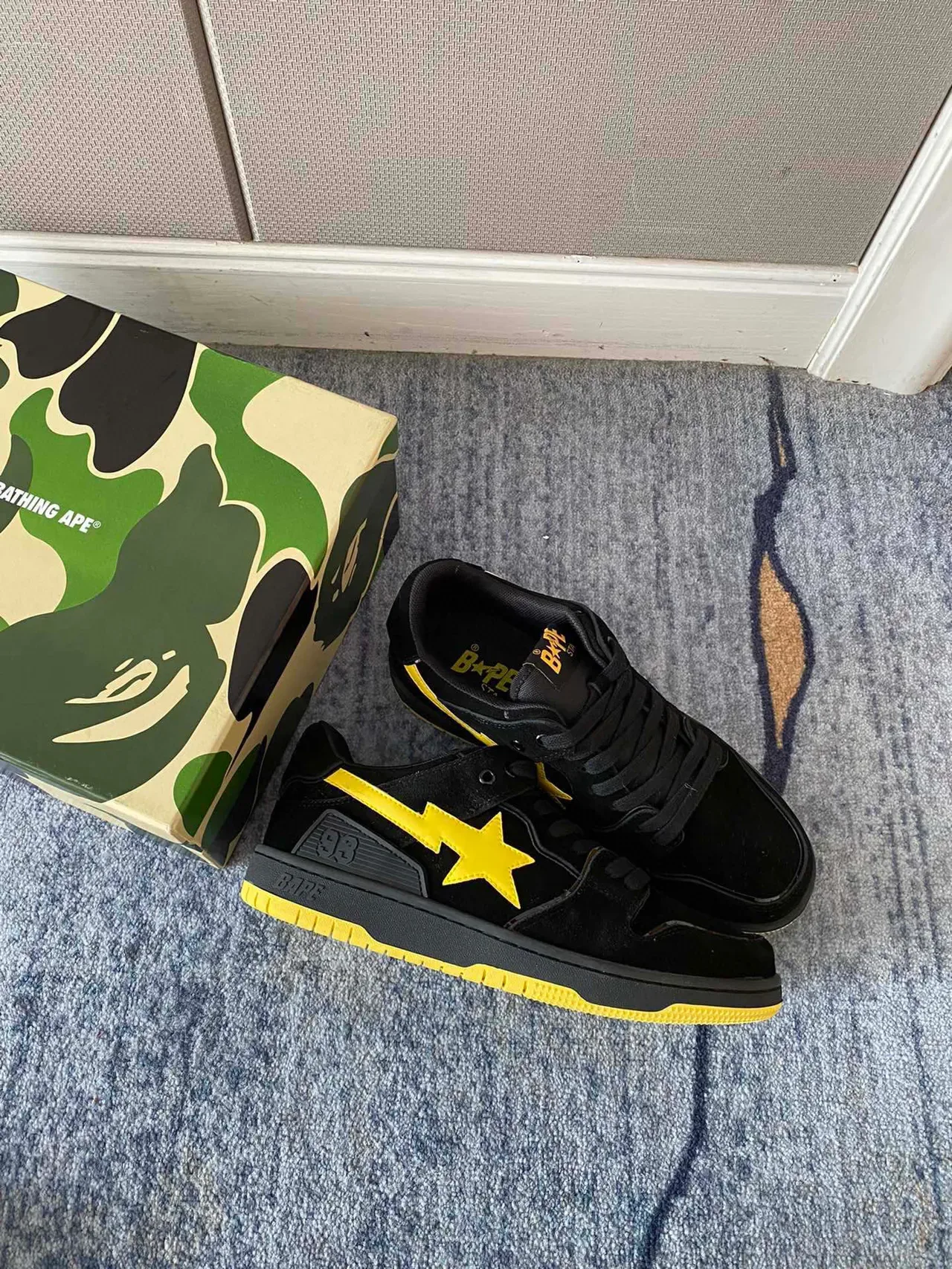 A Bathing Ape أحذية سكيت بورد أسود وأصفر بشعار النجم 6