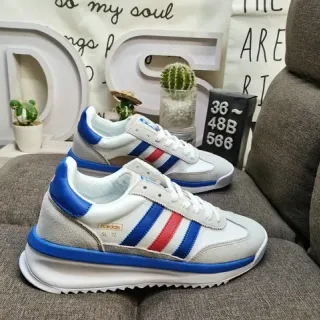 Adidas أبيض أزرق ريترو راينر سيليويت سويد ونسيج علوي لايف ستايل سنيكرز