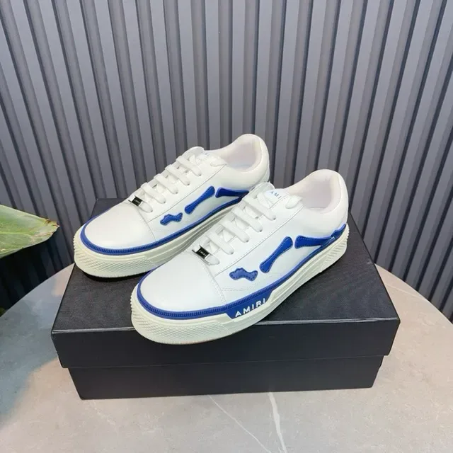 Amiri Skel Top Low Blancos y azules zapatillas lifestyle 6