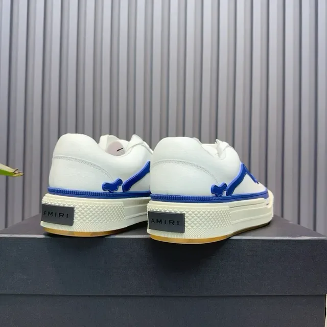 Amiri Skel Top Low Blancos y azules zapatillas lifestyle 9