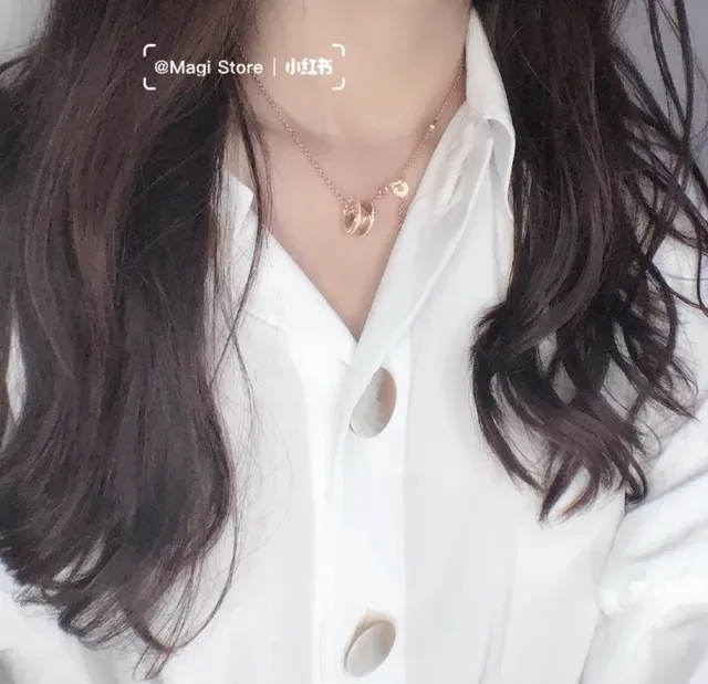 Bvlgari Collier or argent avec bande interlocking, pendentif et accents de diamants pavé 9