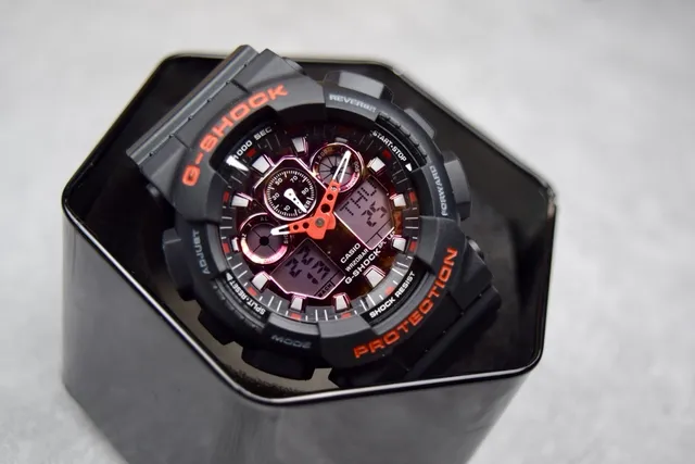 Casio G-Shock GA-100 Black and Orange Sports Watch 4