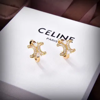 Celine सोने की पारदर्शी चंद्र-आकार की कर्णफूल