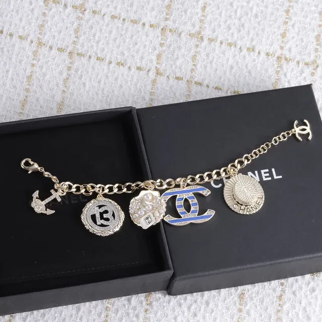 Chanel Multi-Charm Gold-Tone Enamel and Pearl Bracelet 2