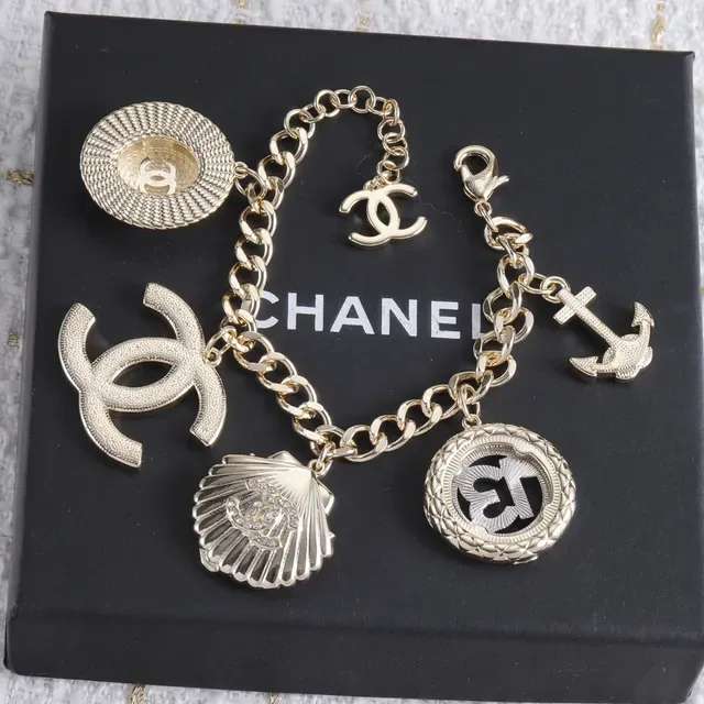 Chanel Multi-Charm Gold-Tone Enamel and Pearl Bracelet 3