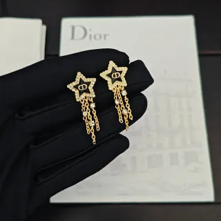 Dior Boucles d'oreilles à perno doré noir en forme d'étoile avec bord de cristal pavé